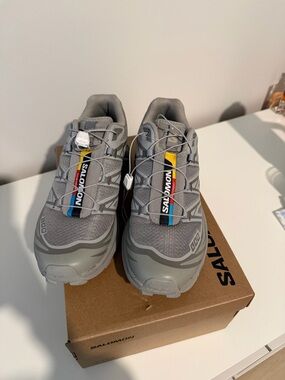 Salomon Gray Trail Sneakers with Multicolor Stripe Detail